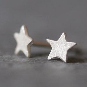 Tiny Star Stud Earrings in Sterling Silver symbols,earrings tiny-star-stud-earrings-in-sterling-silver Default Title
