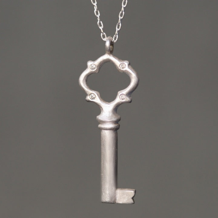 Tiny Victorian Key Pendant in Sterling Silver with Diamonds