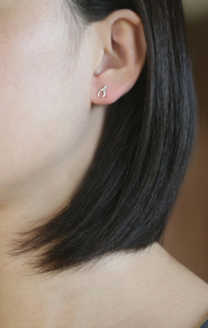 Tiny Wishbone Stud Earrings in Sterling Silver symbols,earrings tiny-wishbone-stud-earrings-in-sterling-silver Default Title